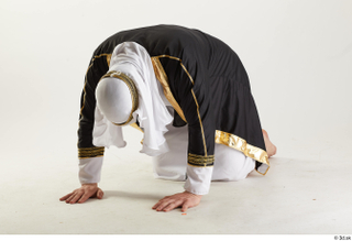 Arthur Fuller Sultan Bowing bowing kneeling whole body 0002.jpg